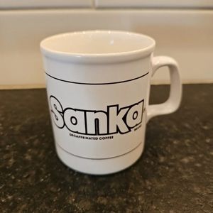 Sanka decaffeinated brand coffee cup